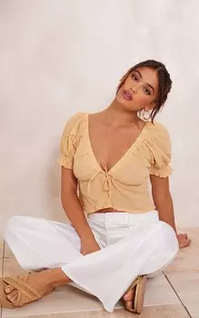 PrettyLittleThing Прозрачный текстурированный укороченный топ персикового цвета с завязками спереди и пышными рукавами