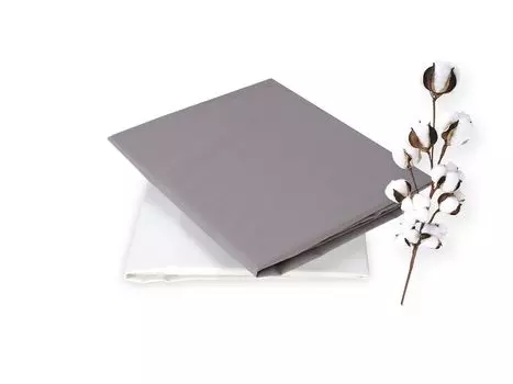 Простыня на резинке 100% чесаный хлопок 70Х160, в упаковке 2 шт. жемчужно-серого и белого цветов. Идеально подходит для кроватей Монтессори Dormalit