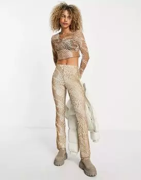 Расклешенные брюки из сетки Topshop с деформированным точечным принтом