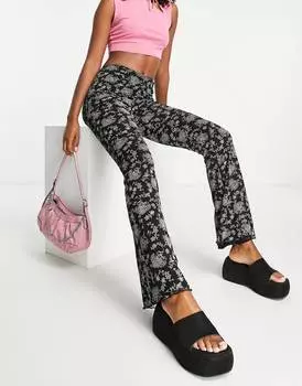 Расклешенные брюки с цветочным принтом и сборками спереди Topshop