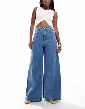 Расклешенные джинсы ASOS DESIGN с защипами-годе, средневыбеленные