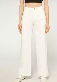 Расклешенные джинсы Calzedonia