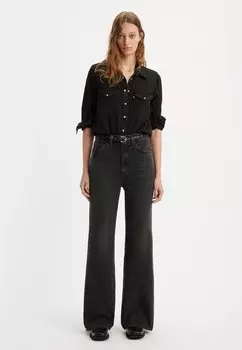 Расклешенные джинсы Levi's RIBCAGE BELLS, в городе без потрескивания