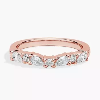 Романтичное кольцо с бриллиантами грушевидной огранки и круглой огранки из розового золота 14 карат (1/2 карата). Blue Nile