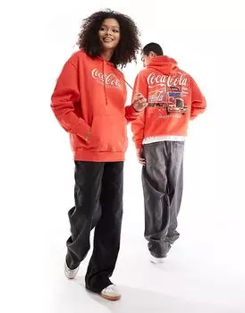 Рождественская унисекс-толстовка оверсайз с праздничным принтом Coca Cola красного цвета ASOS DESIGN