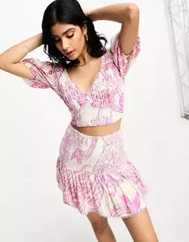 Розовая пляжная мини-юбка со сборками и принтом River Island