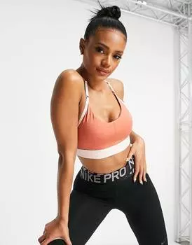 Розово-розовый спортивный бюстгальтер с легкой поддержкой и логотипом Nike Training Indy Dri-FIT