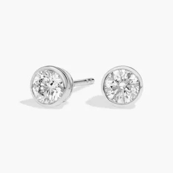 Серьги-гвоздики с бриллиантами в оправе из платины (3/4 карата, Tw. - HI / SI1-SI2) Blue Nile