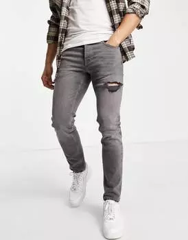 Серые джинсы скинни стрейч с потертостями ASOS DESIGN
