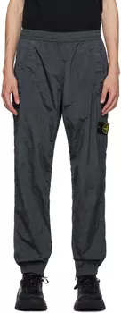 Серые спортивные штаны с нашивками Stone Island