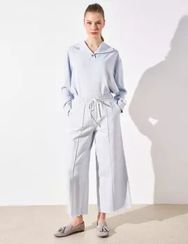 Широкие джинсовые брюки с кисточками синие Kayra