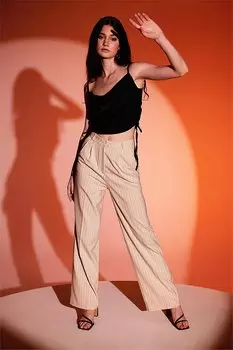 Широкие плиссированные тканевые брюки в полоску цвета экрю SS23P4732EK Sherin