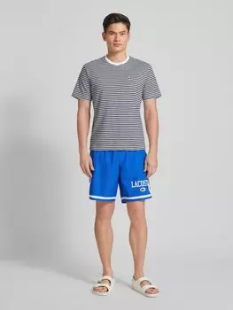 Шорты с этикеткой Lacoste
