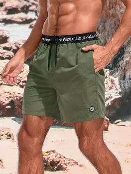 Шорты в цветных блоках и с буквенным узором для мужчин на пляже. с наклонными карманами Для купания, пляжа и отдыха Manfinity, темно-зеленый