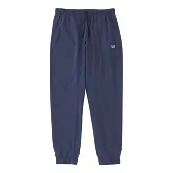 Штаны спортивные необходимые тканые джоггеры New Balance, синий