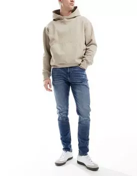 Синие джинсы скинни средней потертости ASOS DESIGN Vintage