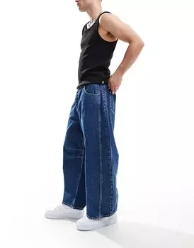 Синие джинсы со вставками ASOS DESIGN и изогнутыми брючинами