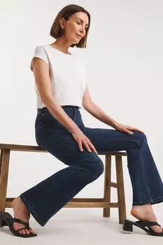 Синие расклешенные джинсы 24/7 Mid Wash JD Williams, синий