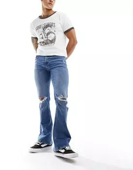 Синие расклешенные джинсы с рваными краями ASOS DESIGN