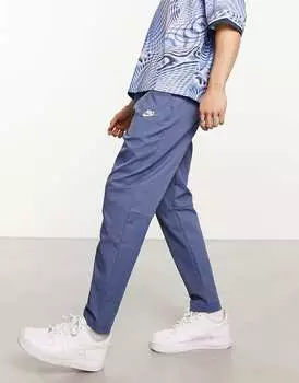 Синие тканые зауженные брюки Nike Club