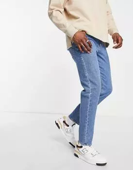 Синие зауженные эластичные джинсы средней потертости ASOS DESIGN