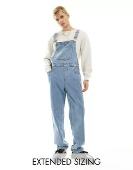 Синий джинсовый комбинезон средней потертости ASOS DESIGN