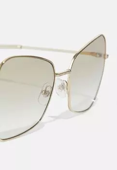 Солнцезащитные очки Swarovski, золотого цвета