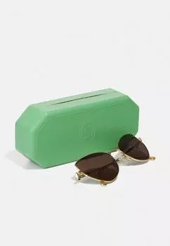 Солнцезащитные очки Swarovski, золотого цвета