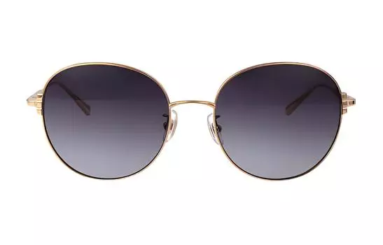 Солнцезащитные очки в круглой оправе Chopard