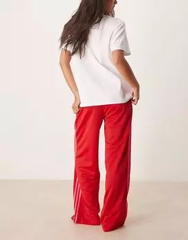 Спортивные брюки Adidas Originals Firebird Loose красного и розового цвета