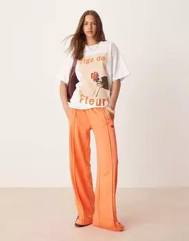 Спортивные брюки Adidas Originals Firebird Loose оранжевого цвета