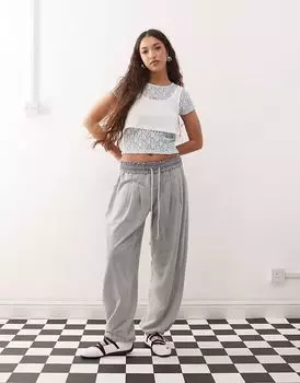 Спортивные брюки ASOS DESIGN с эффектом кислотной стирки и вытачками серого цвета