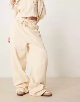 Спортивные брюки ASOS DESIGN с декоративными швами цвета пахты и желтого цвета