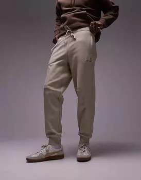 Спортивные брюки Carhartt WIP American Script бежевого цвета