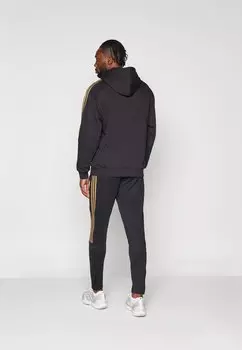 Спортивные брюки House Of Tiro Nations Pack Pant adidas Sportswear, черный/красный "командная победа"