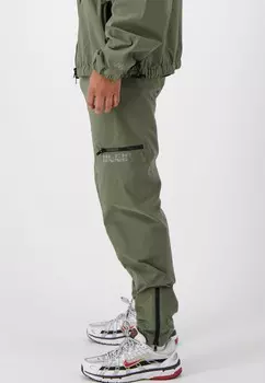 Спортивные брюки INITIAL TECH Black Bananas, цвет Evergreen