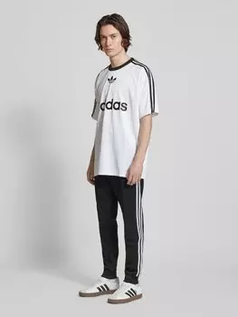 Спортивные брюки классического кроя с этикетками adidas Originals, черный