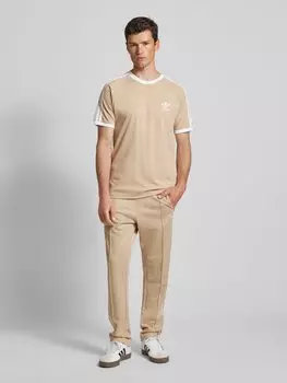 Спортивные брюки классического кроя с карманами на молнии adidas Originals, бежевый