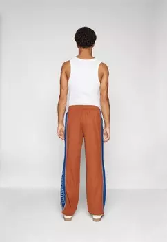 Спортивные брюки Lacoste, темно-красный
