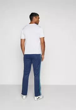 Спортивные брюки MONOGRAM TRACK PANT Umbro, темно-синий