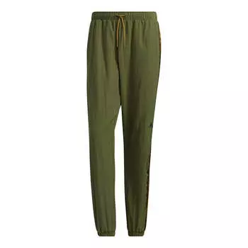 Спортивные штаны adidas M Wrd Wov Pnt Contrasting Colors Woven Loose Bundle Feet Sports Pants Green, зеленый