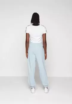 Спортивные штаны Essentials Stripes Loose Pant adidas Sportswear, синие