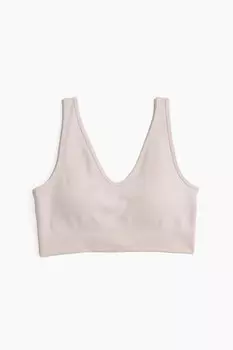 Спортивный бюстгальтер из легкой поддержки Softmove. H&M, розовый