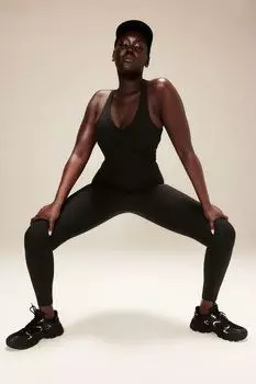 Спортивный комбинезон Shapemove с открытой спиной H&M, черный