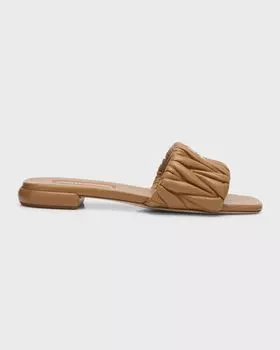 Стеганые кожаные шлепанцы на плоской подошве Miu Miu, цвет Caramello