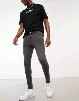 Стираные черные джинсы с эффектом стрейча ASOS