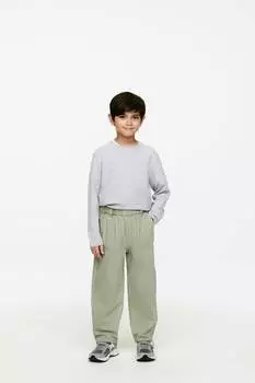 Стираные джинсовые брюки Arket, зеленый