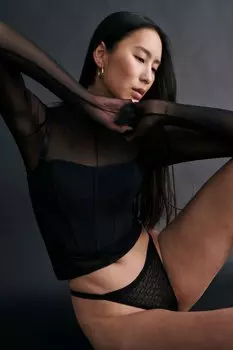 Стринги из сетки с рисунком Triumph, черный