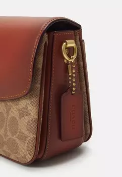 Сумка через плечо COATED SIGNATURE CASSIE CROSSBODY Coach, коричневый
