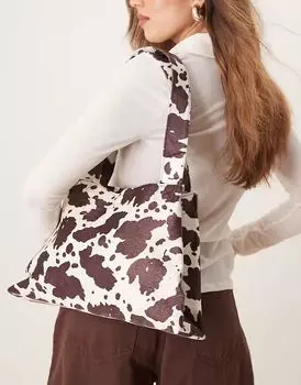 Сумка My Accessories с зауженным плечевым ремешком с принтом коровы